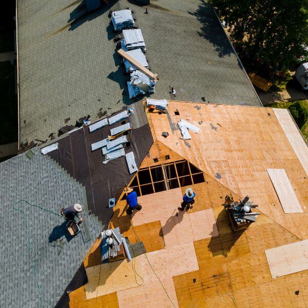 New roof installation in progress by the Roofing Guys Melbourne crew, with timber sheeting and underlay being fitted during a full roof replacement. New roof installation in progress by the Roofing Guys Melbourne crew, with timber sheeting and underlay being fitted during a full roof replacement.