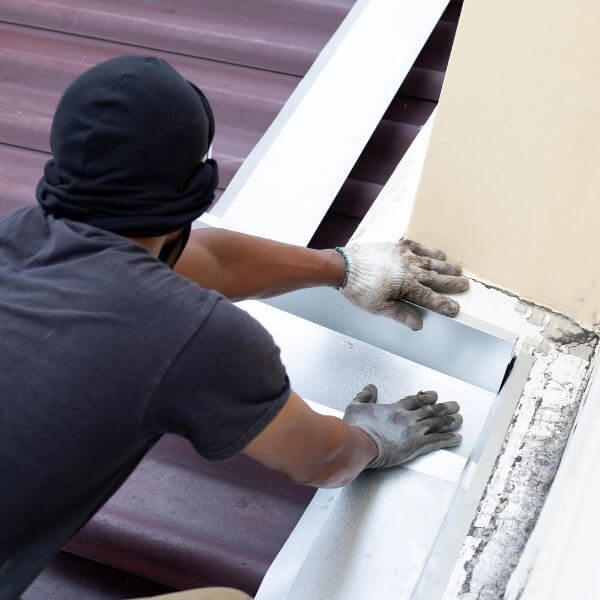 Roof repair in Doncaster with new flashing installed by Roofing Guys Melbourne to seal a roof-to-wall join and stop leaks.